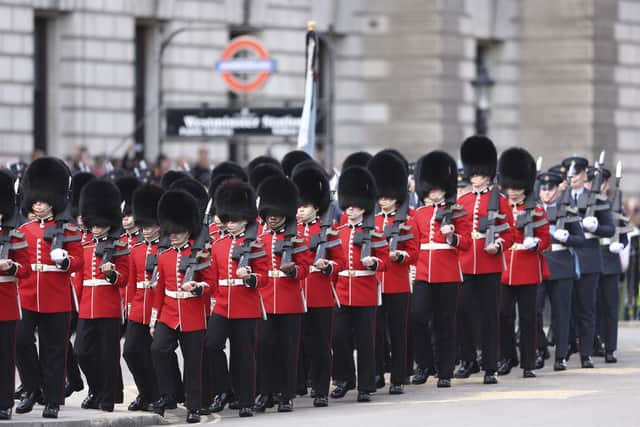Coldstream Guards are seen near Buckingham Palace ahead of the procession of the coffin of Queen Elizabeth II