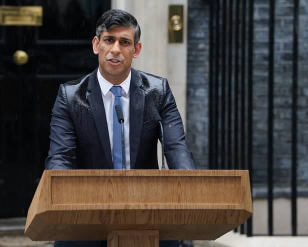 The rain falling on Rishi Sunak as he announced the general election felt like a metaphor to some (Picture: Lucy North/PA)