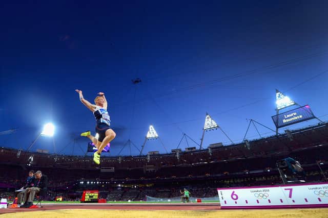 Greg Rutherford of Great Britain on his way to winning the gold medal in the Men's Long Jump Final at London 20212  (Photo by Stu Forster/Getty Images)