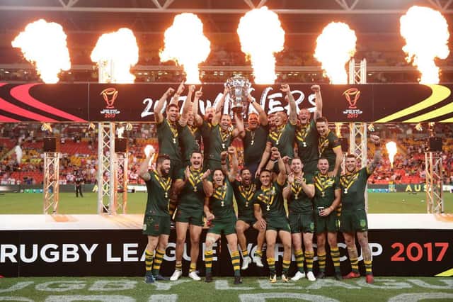 Australia celebrate with the trophy after winning the 2017 Rugby League World Cup Final. The border control issues in Australia are threatening the 2021 tournament.