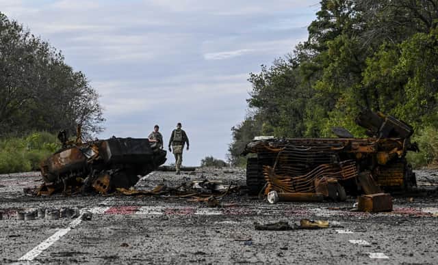 Destroyed armoured vehicles litter the road in Balakliya, Kharkiv region, on Saturday, after Ukrainian troops drove out Russian forces from the area (Picture: Juan Barreto/AFP via Getty Images)