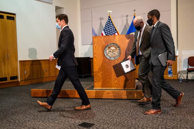 Minneapolis Mayor Jacob Frey, Minnesota Governor Tim Walz, and St. Paul Mayor Melvin Carter walk out after speaking at a press conference about public safety in Minnesota as closing statements were heard in the trial of Derek Chauvin (Getty Images)