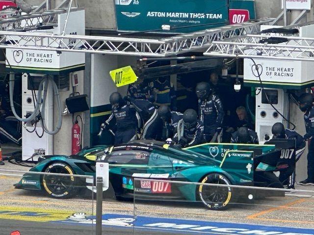 Action in the pit lane as teams race against the clock.