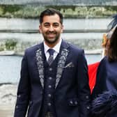 First Minister of Scotland Humza Yousaf and wife Nadia El-Nakla leave Westminster Abbey following the coronation ceremony of King Charles III and Queen Camilla in central London.
