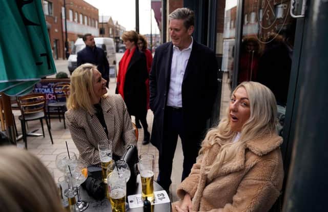 Labour leader Sir Keir Starmer talks to locals while on a walkabout in Hull during campaigning for the local and PCC elections (Photo by Owen Humphreys - Pool /Getty Images)