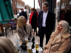Labour leader Sir Keir Starmer talks to locals while on a walkabout in Hull during campaigning for the local and PCC elections (Photo by Owen Humphreys - Pool /Getty Images)