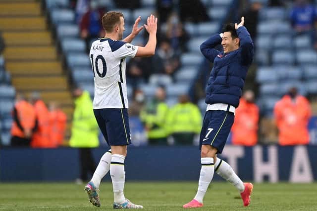 Harry Kane embraces Tottenham Hotspur team-mate Son Heung-Min.