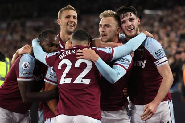 LONDON, ENGLAND - NOVEMBER 07: Pablo Fornals of West Ham United (obscured) celebrates with Michail Antonio, Jarrod Bowen and Declan Rice after scoring their side's second goal during the Premier League match between West Ham United and Liverpool at London Stadium on November 07, 2021 in London, England. (Photo by Alex Pantling/Getty Images)