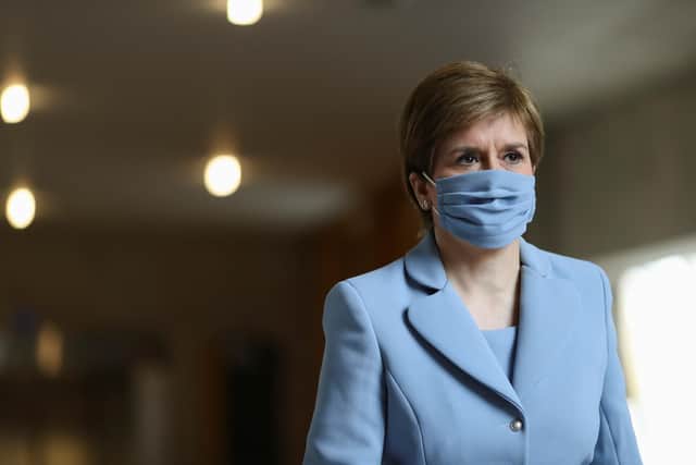 First Minister Nicola Sturgeon arrives for First Minister's Questions at the Scottish Parliament in Holyrood on 27 May (Photo: Russell Cheyne/PA Wire/PA Images)