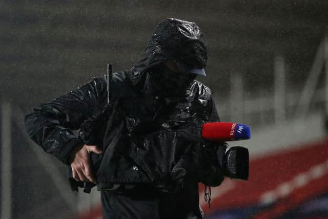 A Sky Sports cameraman is seen during the Betfred Super League match between Leeds Rhinos and Huddersfield Giants.