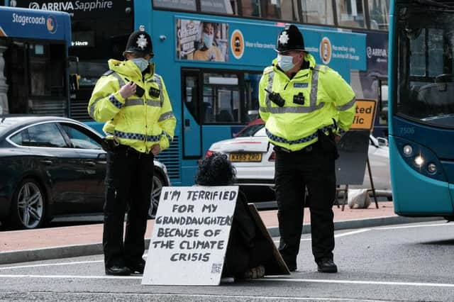 A protestor blocks a Newcastle road (Getty Images)