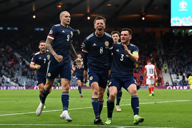 Callum McGregor celebrates with teammates Lyndon Dykes and Andrew Robertson after scoring Scotland's first goal during the Euro 2020 Championship Group D match between Croatia and Scotland (Getty Images)
