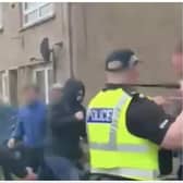 Two officers were injured during the disturbance in Scotland