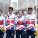 Great Britain's Alex Yee, Georgia Taylor-Brown Jessica Learmonth and Jonathan Brownlee pose on the podium. (Photo by Charly TRIBALLEAU / AFP) (Photo by CHARLY TRIBALLEAU/AFP via Getty Images)