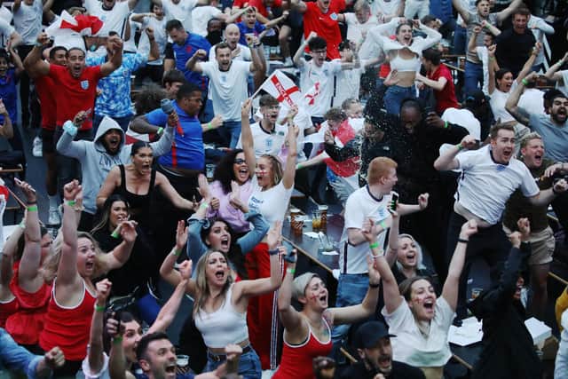 England fans pictured celebrating the semi final win over Denmark. (Pic: Getty)