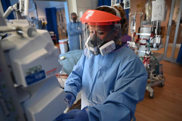 Members clinical staff wear personal protective equipment as they care for patients at the Intensive Care unit at Royal Papworth Hospital on May 5, 2020 (AFP/Getty)