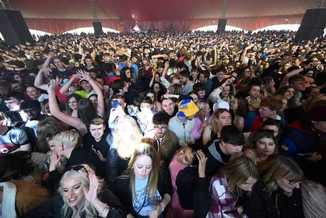 Concert-goers were among a non-socially-distanced crowd of 5,000 as part of a pilot programme to examine ways of putting on events in a post-covid-19 world (Paul Ellis/AFP/Getty)