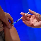 Three-quarters of adults in the UK have received both doses of a Covid-19 vaccine (Photo by JUSTIN TALLIS/AFP via Getty Images)