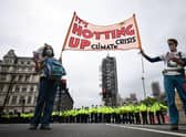 Climate change activists have been campaigning for a greener economy as the UK prepares to host COP26