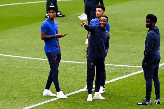 Marcus Rashford, Jadon Sancho and Bukayo Saka (pictured with Raheem Sterling) has been racially abused online following their Euro 2020 final result (Picture: Getty Images)