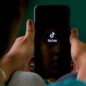 A mum has shared her concerns over graphic footage her daughter has seen on TikTok - and urges other parents to keep an eye on what their youngsters are viewing (Getty).