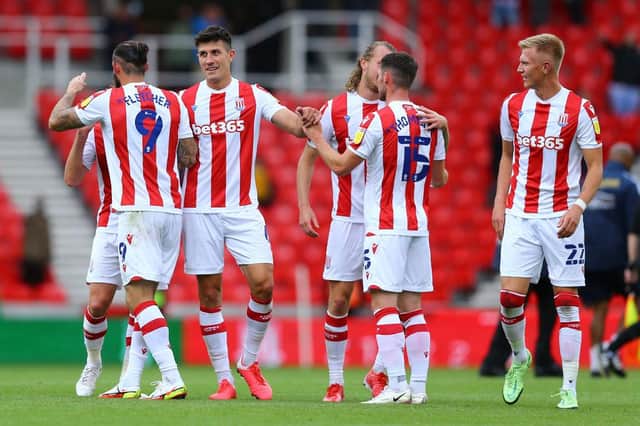 Stoke City players celebrate their first opening day victory since 2009.