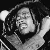 Today would have been Bob Marley's 79th birthday - so will any of his songs re-enter the UK Top 40 this week? (Credit: Getty)