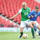 Hibs left-back Josh Doig has been linked with a move to Leeds United.