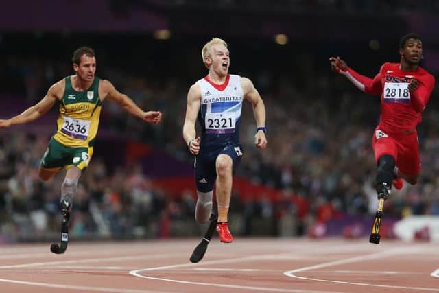 GB sprinter Jonnie Peacock (centre) is bidding for a third consecutive 100m Paralympic title when he competes in the reclassified T64 sprint in Tokyo. (Pic: Getty)