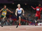 GB sprinter Jonnie Peacock (centre) is bidding for a third consecutive 100m Paralympic title when he competes in the reclassified T64 sprint in Tokyo. (Pic: Getty)
