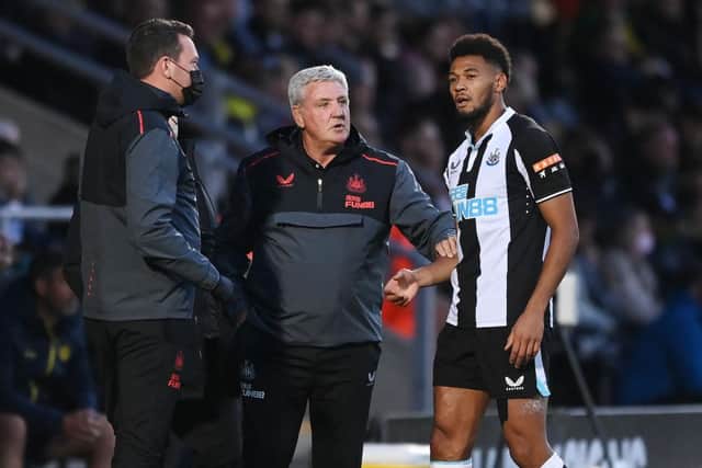 Newcastle manager Steve Bruce speaks to Joelinton of Newcastle during the pre-season friendly between Burton Albion and Newcastle United at the Pirelli Stadium on July 30, 2021 in Burton-upon-Trent, England. (Photo by Michael Regan/Getty Images)