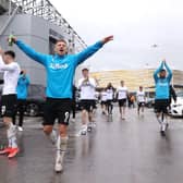 Martyn Waghorn of Derby County celebrates with fans outside the stadium as they secure safety in the Championship the Sky Bet Championship match between Derby County and Sheffield Wednesday at Pride Park Stadium.
