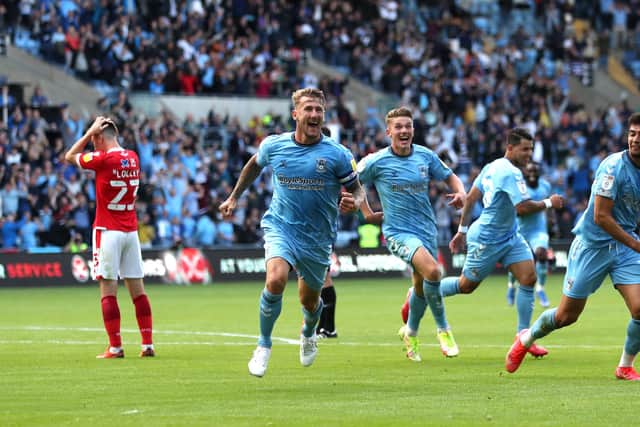 Coventry City's Kyle McFadzean celebrates after scoring his side's second goal to stun Nottingham Forest.