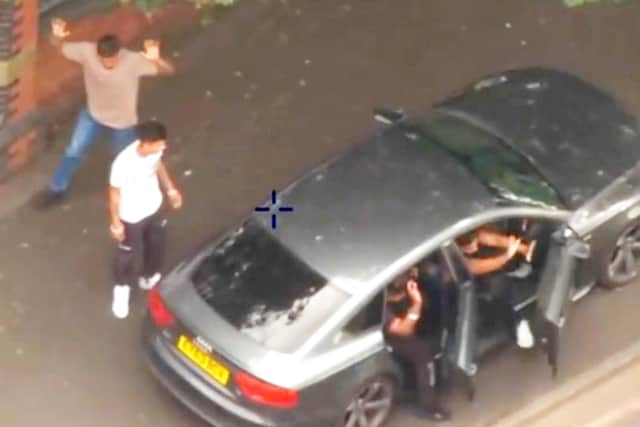 A police drone filmed the gang being arrested by armed police and a dog team who surrounded their Audi getaway car.