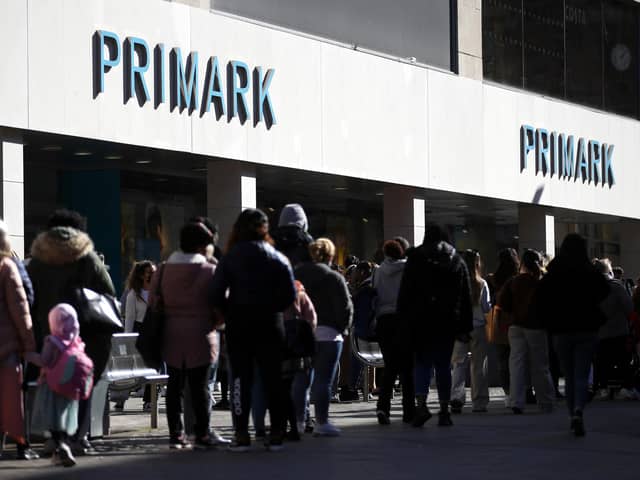 Shoppers queue outside Primark in Nottingham