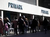 Shoppers queue outside Primark in Nottingham