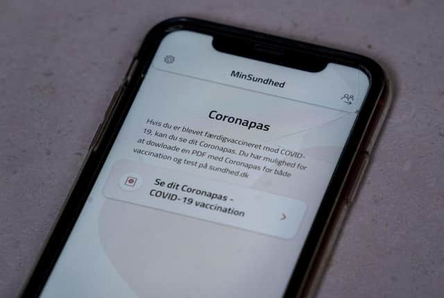 A smartphone showing Denmark's MinSundhed app and Corona passport link. The pass certifies that someone has either been fully vaccinated, has tested negative in the last 72 hours, or has tested positive two to 12 weeks earlier, conferring immunity to the virus.