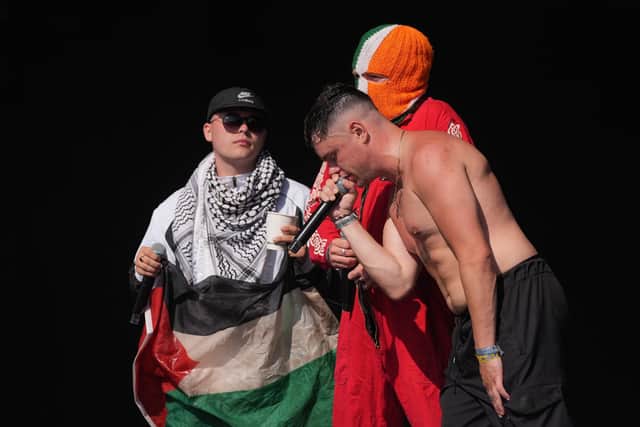Kneecap performing on the West Holts Stage during the Glastonbury Festival on Saturday. Photo: Yui Mok/PA Wire