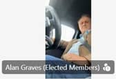 Alan Graves pictured driving his car while on a Derbyshire County Council meeting. Image from Derbyshire County Council.