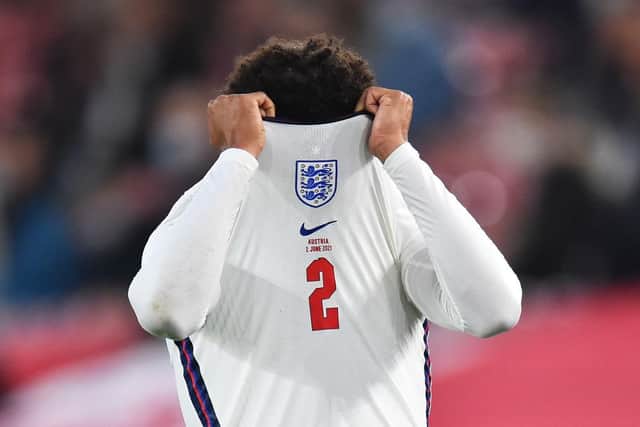 Trent Alexander-Arnold of England looks dejected after picking up an injury against Austria.