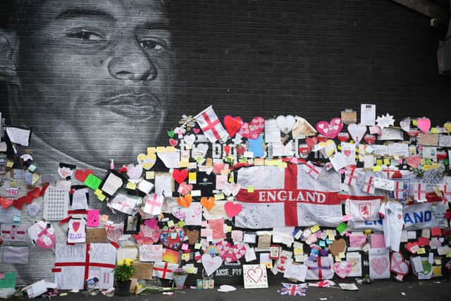 The Marcus Rashford mural in Withington pictured with messages of support of the England footballer. (Pic: Getty)