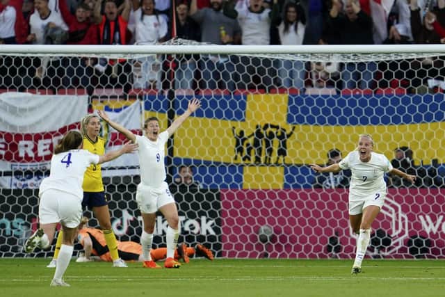 England's Beth Mead, right, after scoring her side's first goal during the Women's Euro 2022 semi final against Sweden on Tuesday. Picture: AP Photo/Jon Super