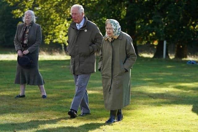 Green credentials: The Queen and Prince Charles recently planted a tree on her Balmoral Estate.