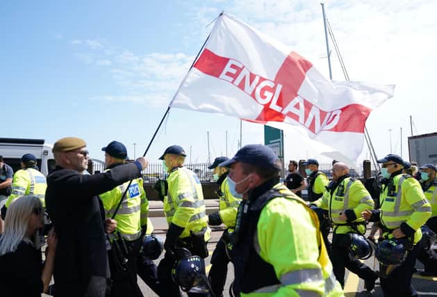 English nationalists protested against allowing migrants - many of them fleeing war-torn countries - into the UK (PA)