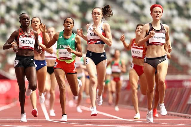 TOKYO, JAPAN - AUGUST 02: Winny Chebet of Team Kenya, Freweyni Gebreezibeher of Team Ethiopia, Laura Muir of Team Great Britain and Gabriela Debues-Stafford of Team Canada compete in round one of the Women's 1500m heats on day ten of the Tokyo 2020 Olympic Games at Olympic Stadium on August 02, 2021 in Tokyo, Japan. (Photo by Ryan Pierse/Getty Images)