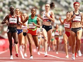 TOKYO, JAPAN - AUGUST 02: Winny Chebet of Team Kenya, Freweyni Gebreezibeher of Team Ethiopia, Laura Muir of Team Great Britain and Gabriela Debues-Stafford of Team Canada compete in round one of the Women's 1500m heats on day ten of the Tokyo 2020 Olympic Games at Olympic Stadium on August 02, 2021 in Tokyo, Japan. (Photo by Ryan Pierse/Getty Images)