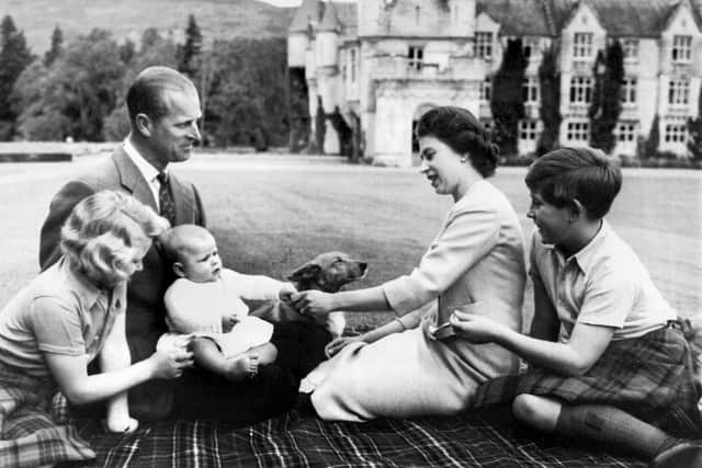 Queen Elizabeth II Prince Philip, Duke of Edinburgh and their three children Prince Charles, Princess Anne and Prince Andrew pose in the grounds of Balmoral Castle