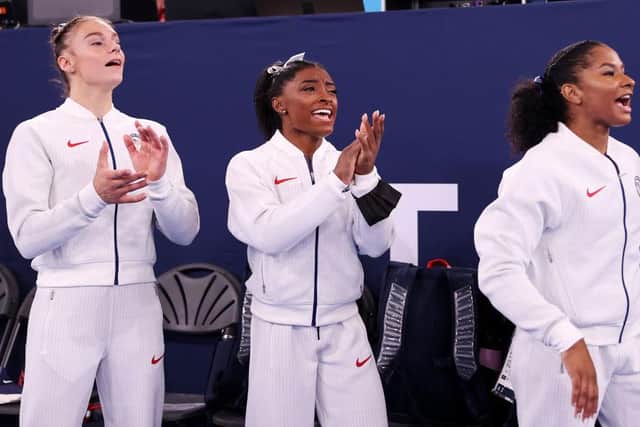 Grace McCallum, Simone Biles, and Jordan Chiles of Team United States. (Photo by Laurence Griffiths/Getty Images)