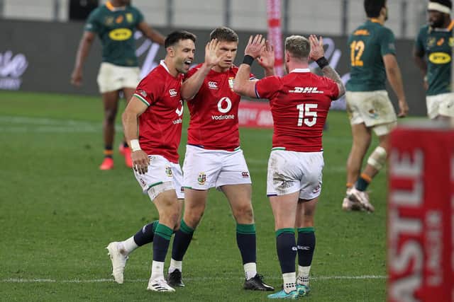 CAPE TOWN, SOUTH AFRICA - JULY 24: Conor Murray, Owen Farrell and Stuart Hogg of the B&I Lions celebrate during the Castle Lager Lions Series 1st Test match between South Africa and British and Irish Lions at Cape Town Stadium on July 24, 2021 in Cape Town, South Africa. (Photo by EJ Langner/Gallo Images/Getty Images)