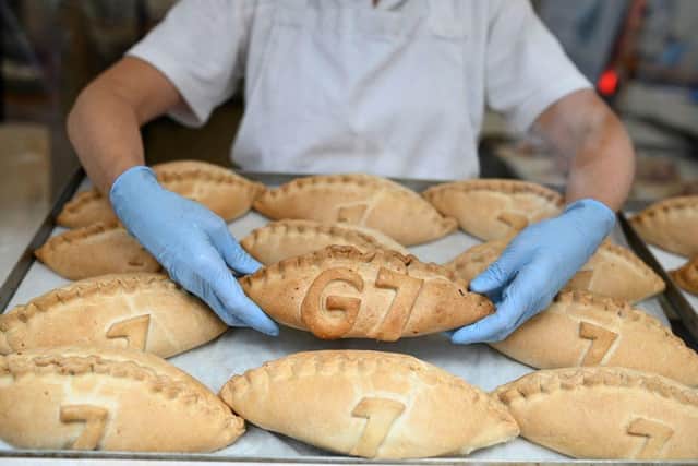 Freshly baked G7 Cornish pasties are placed in the window of a pastry shop in Cornwall on the first day of the three-day G7 Summit (Photo by Oli SCARFF / AFP) (Photo: OLI SCARFF/AFP via Getty Images)